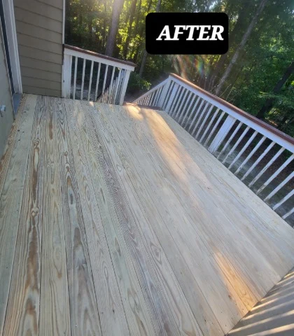 Wood deck repair in Raleigh NC – damaged deck boards being replaced