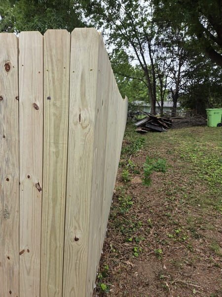 Straight alignment detail of new 6ft wood privacy fence installation in Raleigh NC