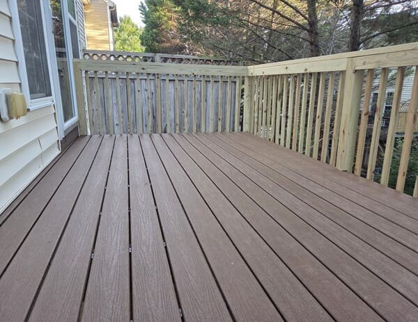 New composite deck boards and handrails replacement project by Innovation's Fence & Deck in Raleigh, NC
